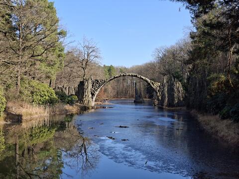 Rakotzbrücke stone bridge in Germany photographed in winter with ice instead of reflection