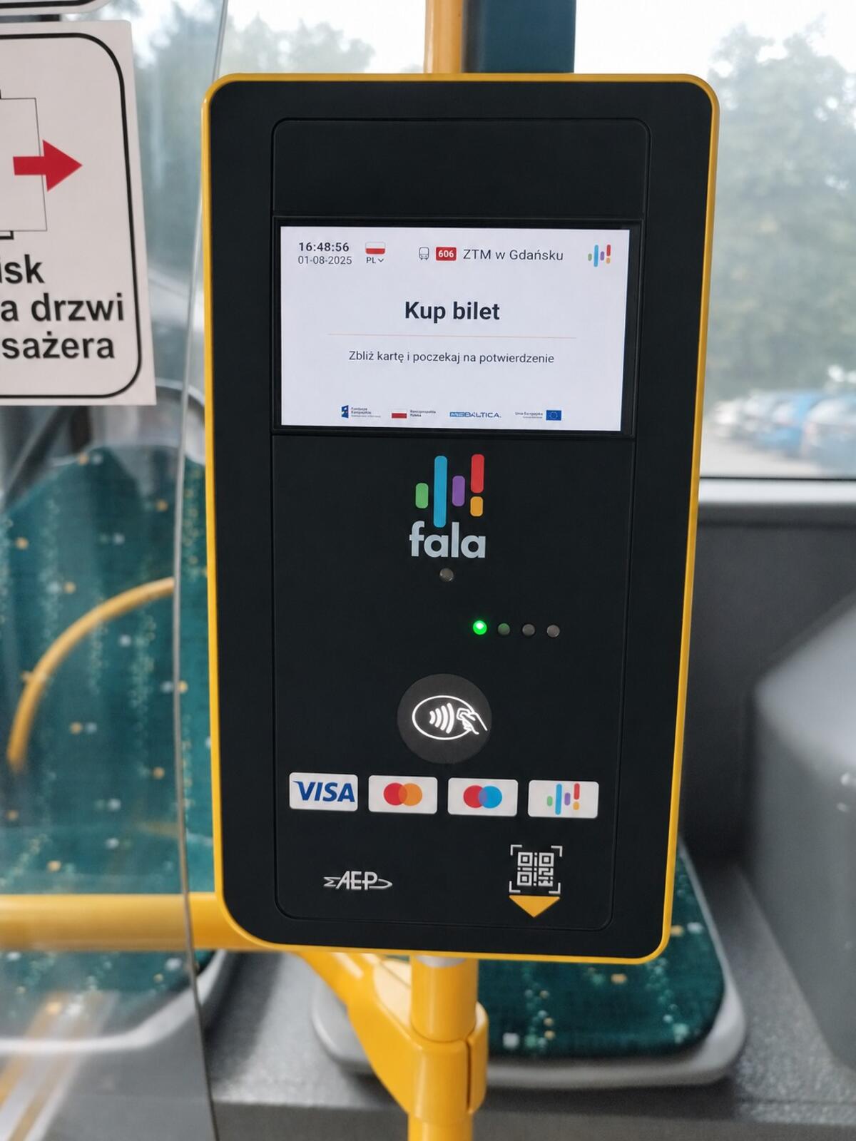 ticket machine inside the bus